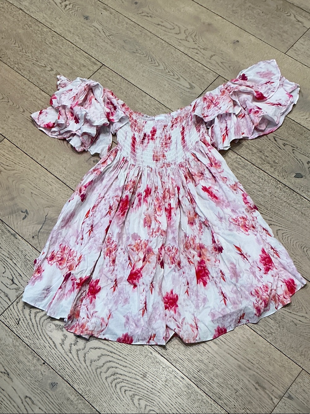 Woman’s Misa pink/white flowered dress. Medium. Smock top. Worn on/off shoulder.